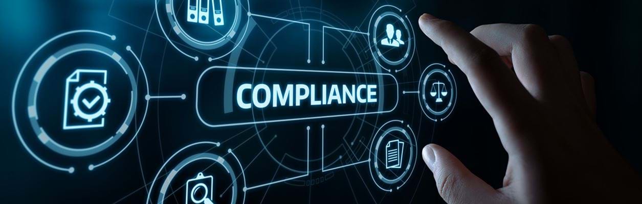 Sign that says "compliance" with related icons